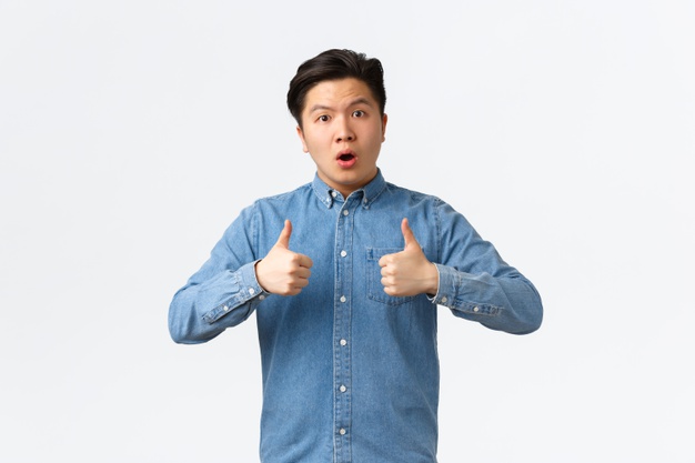 impressed astounded handsome asian guy showing thumbs up looking astonished congrats person with excellent work unexpected good work saying well done white wall 1258 17527 impressed astounded handsome asian guy showing thumbs up looking astonished congrats person with excellent work unexpected good work saying well done white wall 1258 17527